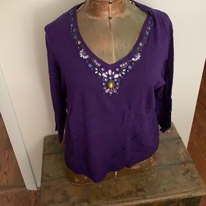 Deep purple V neck sweater.